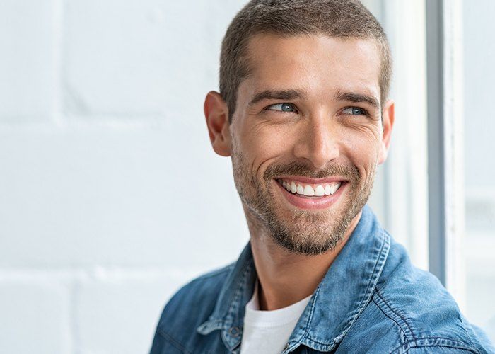 Man with attractive smile after cosmetic dentistry