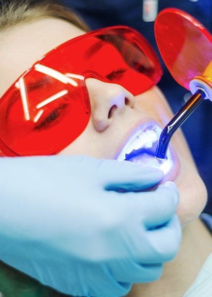 Patient receiving cosmetic dental bonding