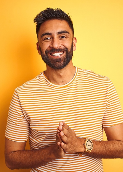 Man with flawless smile after teeth whitening