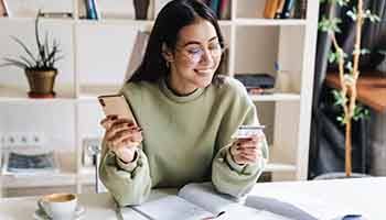 Woman using a credit card