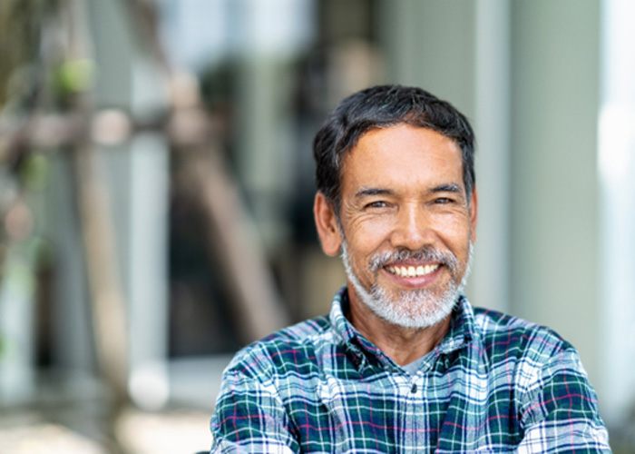 A happy and smiling mature man