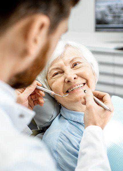 Dentist treating dental patient