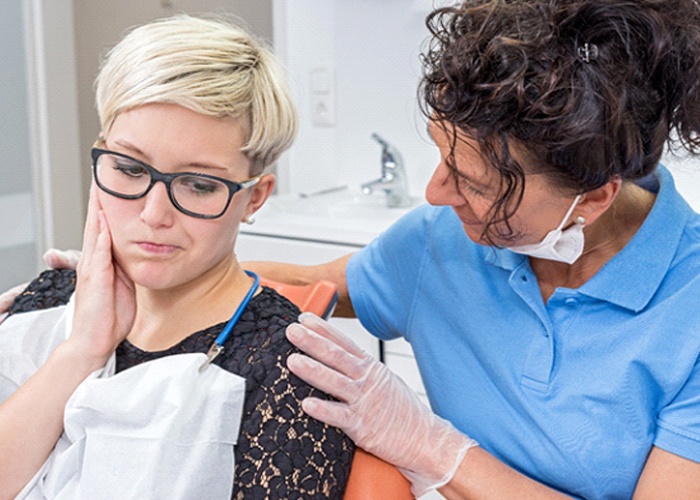 Woman at dentist for nightguards in South Portland