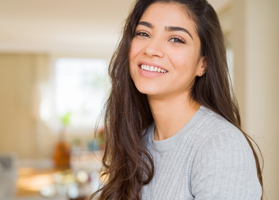 closeup of young woman smiling