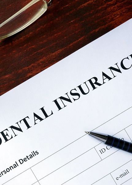Dental insurance paperwork in South Portland