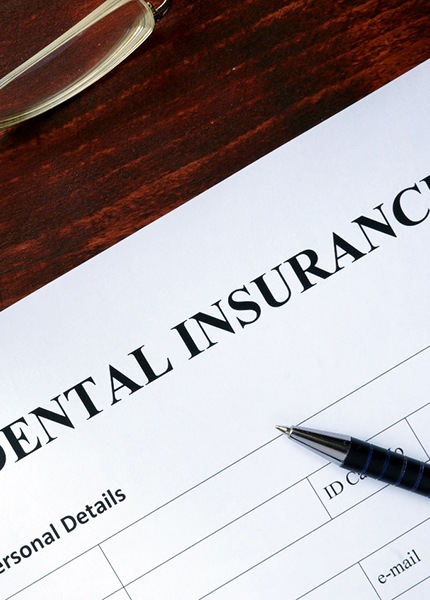 Dental insurance paperwork in South Portland