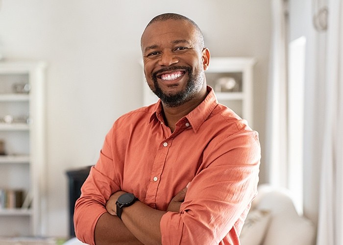 Man smiling after T M J therapy