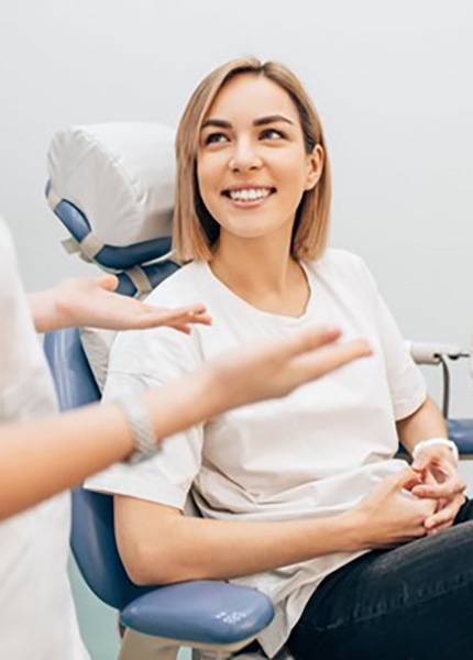 a patient visiting her dentist in South Portland, MEt